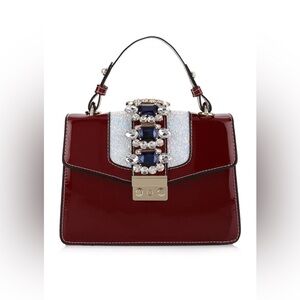 Izzy K All Decked Up Cherry Red Handbag EUC LNC